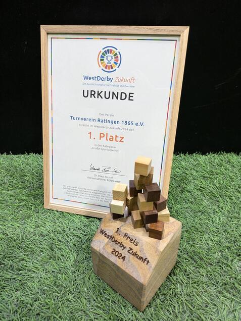Urkunde und Preis f&uuml;r den Turnverein Ratingen 1865 e.V. f&uuml;r den 1. Platz im Wettbewerb WestDerby Zukunft 2024.